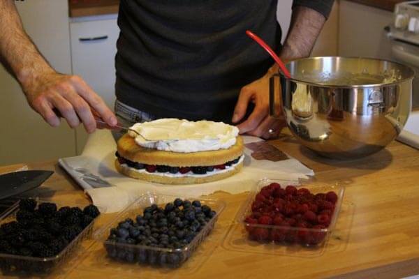 Assembling the berry cake