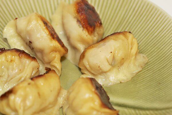 Pan-fried Chinese pork and shrimp dumplings (jiao zi)
